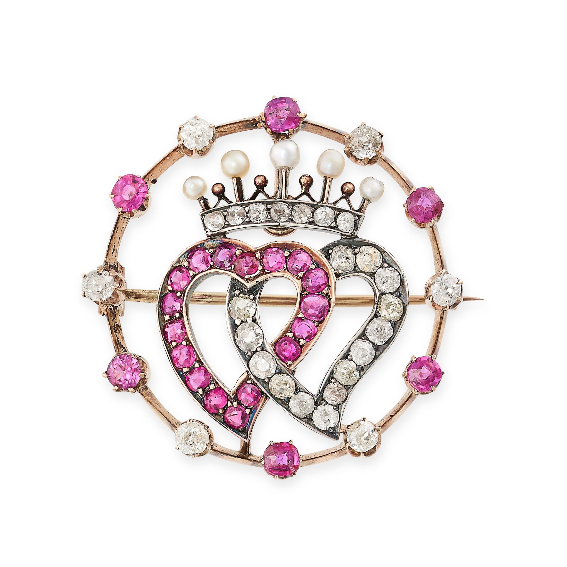 A RUBY AND DIAMOND SWEETHEART BROOCH comprising two interlocking hearts set with round cut rubies