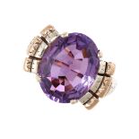 NO RESERVE - A VINTAGE AMETHYST RING set with an oval cut amethyst, stamped 9ct, size M / 6.25, 6.