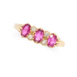 A RUBY AND DIAMOND RING in 18ct yellow gold, set with three oval cut rubies punctuated by pairs of