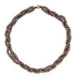 NO RESERVE - A THREE ROW BLACK PEARL NECKLACE comprising three rows of black pearls of 5.2mm,