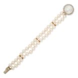 A PEARL AND DIAMOND BRACELET comprising two rows of pearls, the clasp set with a mabe pearl of 18.