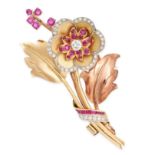 A VINTAGE RUBY AND DIAMOND FLOWER BROOCH in yellow gold, designed as a floral spray, set with old