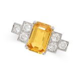 A YELLOW SAPPHIRE AND DIAMOND RING set with an emerald cut yellow sapphire of 3.00 carats,