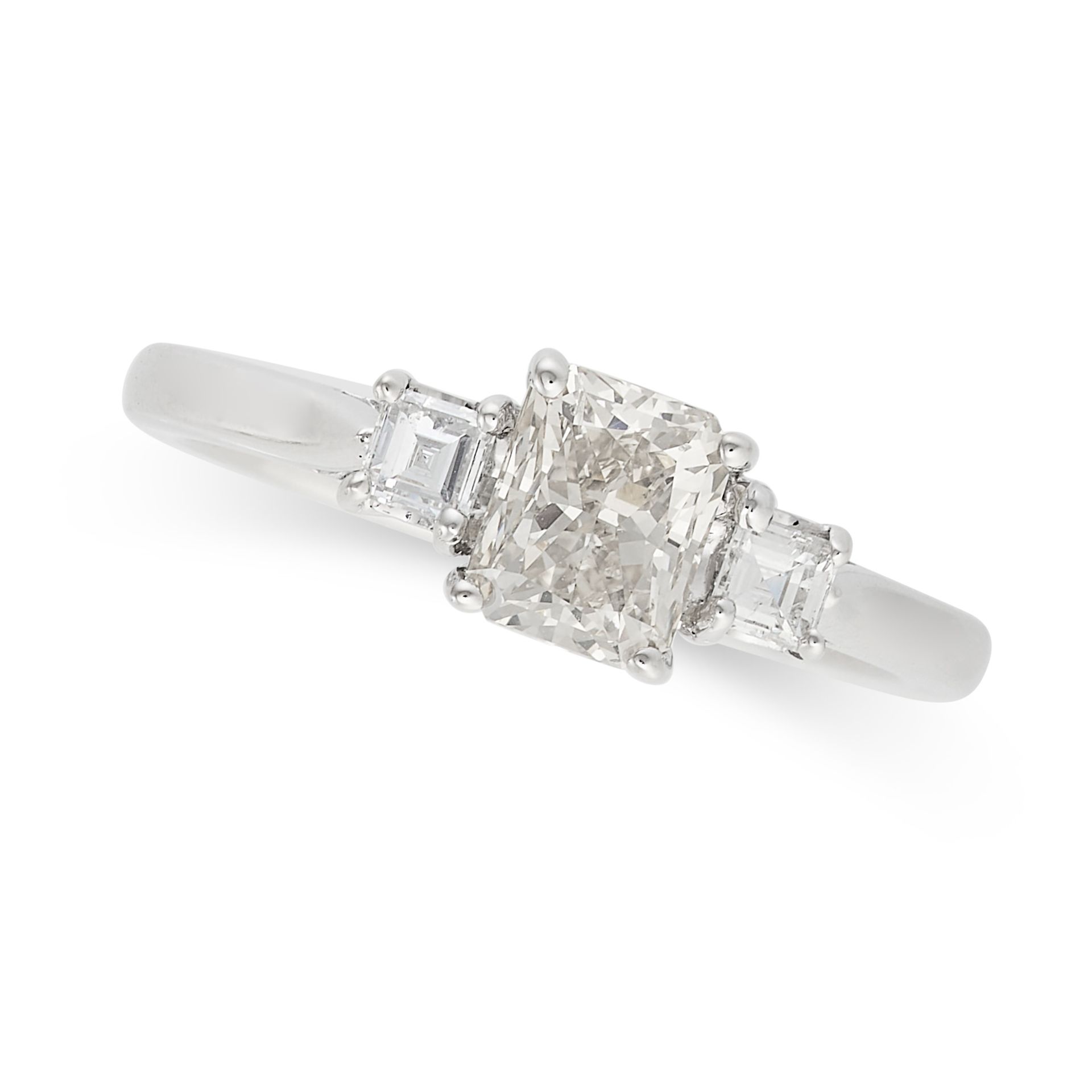 A DIAMOND THREE STONE RING in 18ct white gold, set with a radiant cut diamond of 1.10 carats between