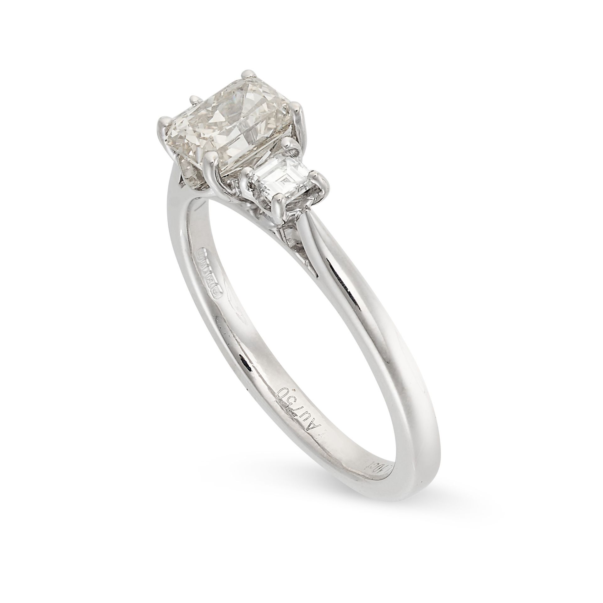 A DIAMOND THREE STONE RING in 18ct white gold, set with a radiant cut diamond of 1.10 carats between - Bild 2 aus 2