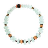 AN AQUAMARINE, CORAL, DIAMOND AND ONYX NECKLACE comprising a row of graduated polished aquamarine