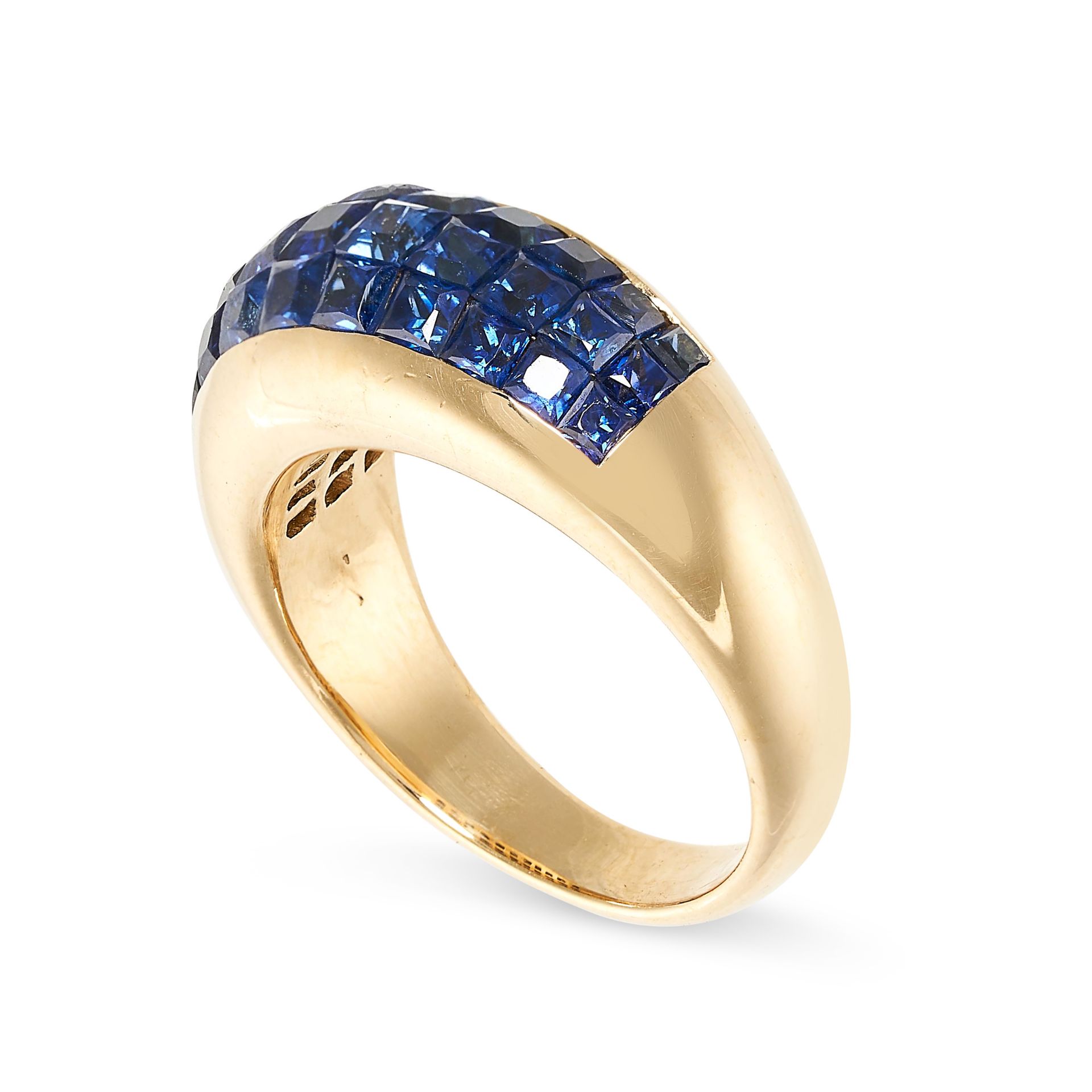 A SAPPHIRE BOMBE RING in 18ct yellow gold, set with three rows of step cut invisibly set blue - Bild 2 aus 2