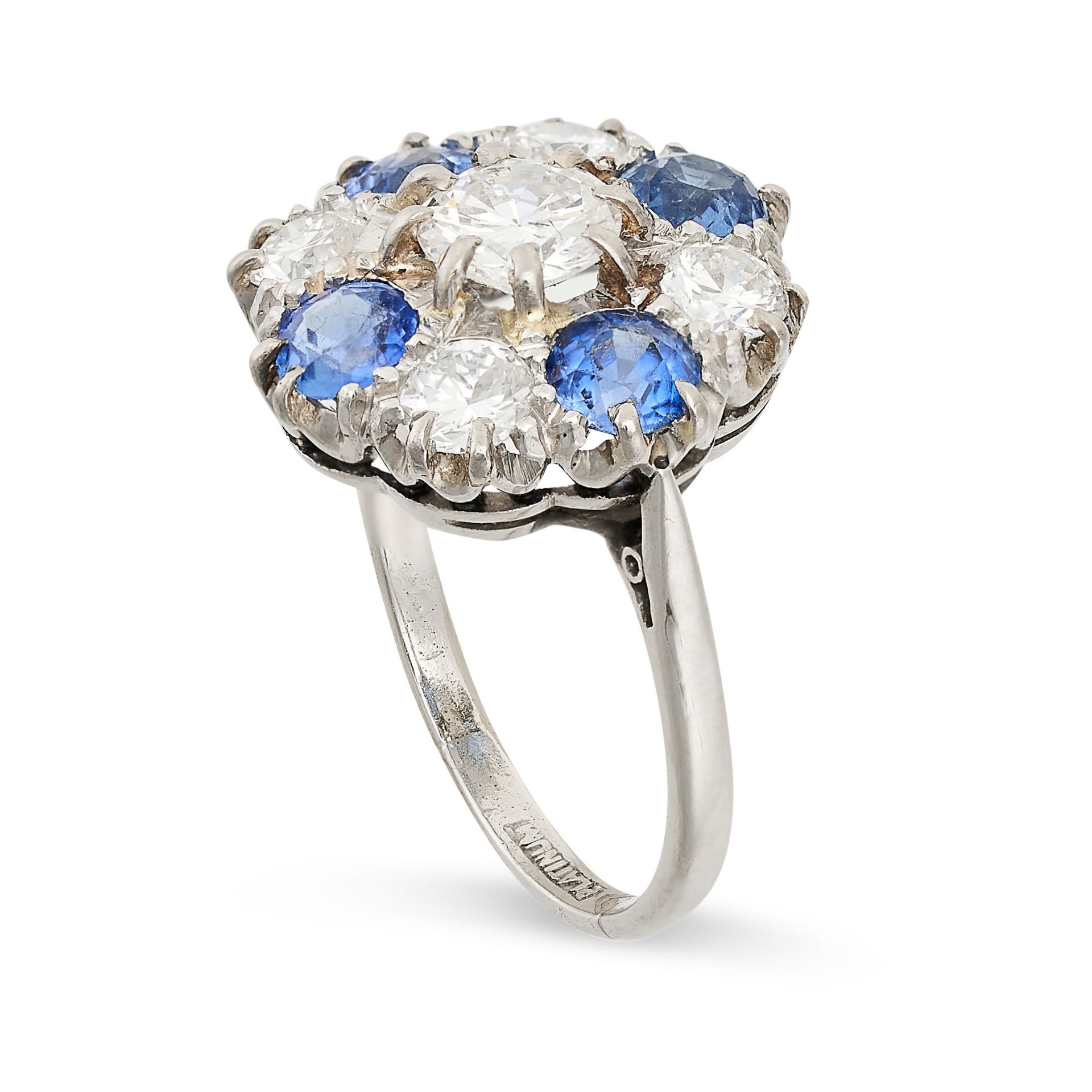 A SAPPHIRE AND DIAMOND RING set with a round brilliant cut diamond in a border of alternating - Bild 2 aus 2