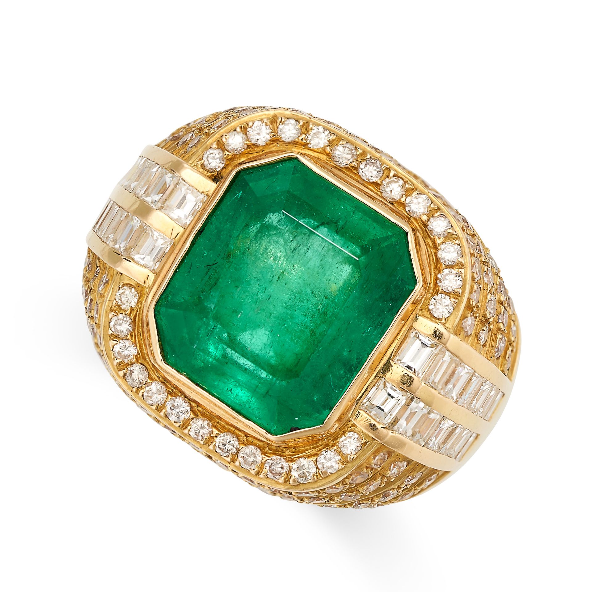 A COLOMBIAN EMERALD AND DIAMOND RING set with an emerald cut emerald of 7.17 carats in a border of