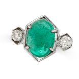 AN EMERALD AND DIAMOND RING in 18ct white gold, set with a cabochon emerald of 2.00 carats, accented