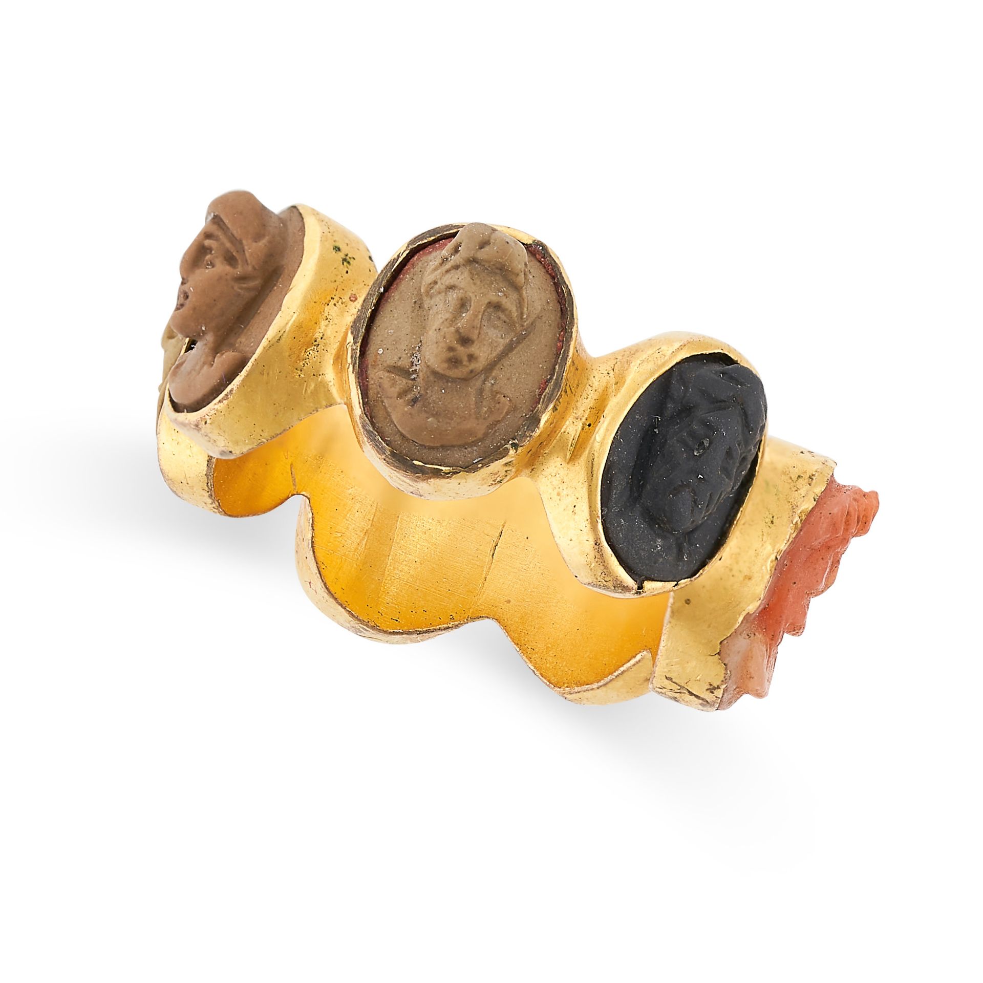 A PAIR OF ANTIQUE LAVA CAMEO RINGS set with carved volcanic lava and coral cameos depicting the - Image 2 of 2