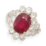 AN UNHEATED RUBY AND DIAMOND CLUSTER RING in 18ct white gold, set with an oval cut ruby of 5.16