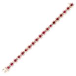 A RUBY AND DIAMOND BRACELET in yellow gold, set with nineteen oval cut ruby and diamond clusters,