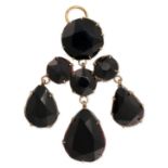 AN ANTIQUE 'QUEEN ANNE' PASTE GIRANDOLE PENDANT set with a large circular cut very dark purple (