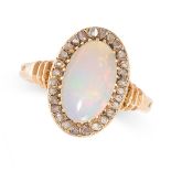 AN OPAL AND DIAMOND CLUSTER RING in 18ct yellow gold, set with an oval cabochon opal in a cluster of