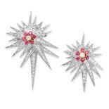 A PAIR OF VINTAGE DIAMOND AND RUBY STAR BROOCHES each designed as an abstract star with many rays,