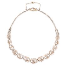 A FINE ANTIQUE FRENCH DIAMOND NECKLACE in 18ct yellow gold and silver, formed of a series of