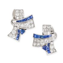 A PAIR OF ART DECO SAPPHIRE DIAMOND CLIP EARRINGS designed as a pair of scrolling ribbons, set