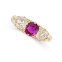 A RUBY AND DIAMOND THREE STONE RING in 18ct yellow gold, set with a cushion cut ruby of 0.81