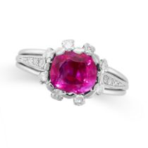 A FINE BURMA NO HEAT RUBY AND DIAMOND RING set with a cushion cut ruby of 2.02 carats within a