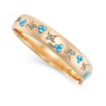 AN ANTIQUE TURQUOISE AND DIAMOND BANGLE in yellow gold, set with cabochon turquoise and old and rose