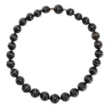 AN ANTIQUE BANDED AGATE BEAD NECKLACE comprising a single row of twenty-nine graduated polished