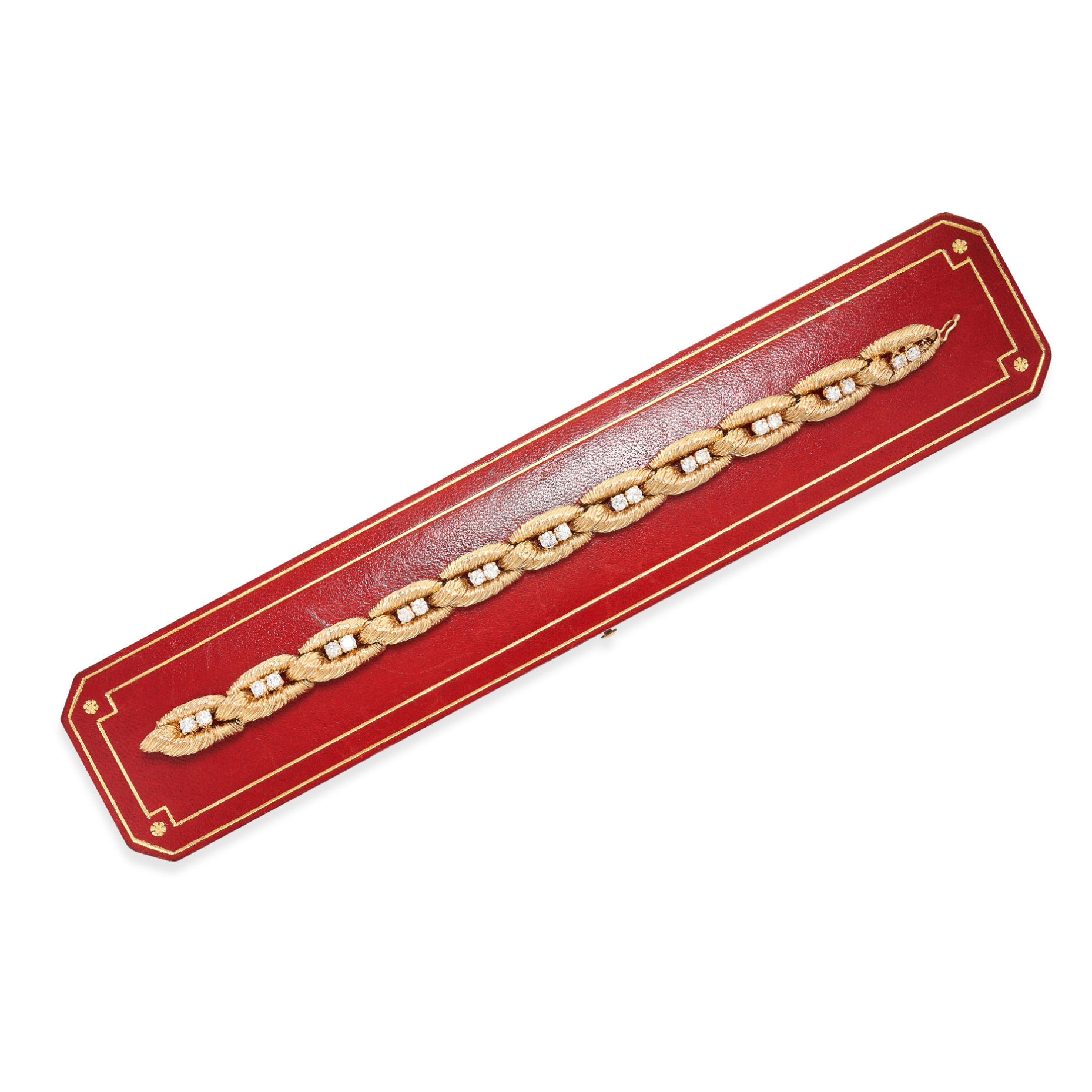 CARTIER, A VINTAGE DIAMOND BRACELET in 18ct yellow gold, the textured links set with pairs of