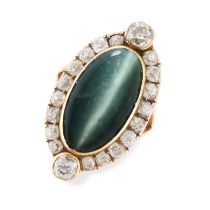 A FINE CAT'S EYE CHRYSOBERYL AND DIAMOND RING in yellow gold, set with a cabochon cat's eye