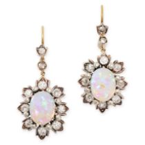 A PAIR OF ANTIQUE OPAL AND DIAMOND DROP EARRINGS in yellow gold and silver, each set with an oval
