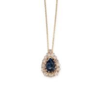 A BLUE SPINEL AND DIAMOND PENDANT NECKLACE in 18ct yellow gold, set with a pear cut spinel within