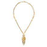 AN ANTIQUE LOCKET TASSEL PENDANT AND CHAIN, 19TH CENTURY in yellow gold, the oval pendant in the