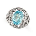 A BLUE ZIRCON AND DIAMOND DRESS RING set with a cushion cut blue zircon of 5.76 carats, accented