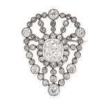 A FINE ANTIQUE DIAMOND BROOCH set with an old mine cushion cut diamond of 4.00 carats in a cluster