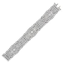 AN IMPORTANT ART DECO DIAMOND BRACELET in 18ct white gold, the geometric links set with three