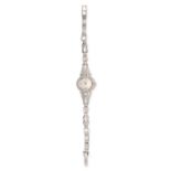 AN ART DECO DIAMOND LADIES COCKTAIL WATCH in platinum, the circular dial within a diamond set bezel,