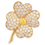 VAN CLEEF & ARPELS, A YELLOW DIAMOND AND WHITE DIAMOND COSMOS BROOCH in 18ct yellow gold, designed