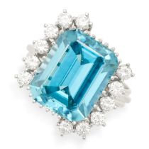 A BLUE ZIRCON AND DIAMOND RING set with an emerald cut blue zircon of 14.14 carats accented by round