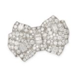 TIFFANY & CO, A FINE ART DECO DIAMOND BOW BROOCH in platinum, designed as a bow, set with round