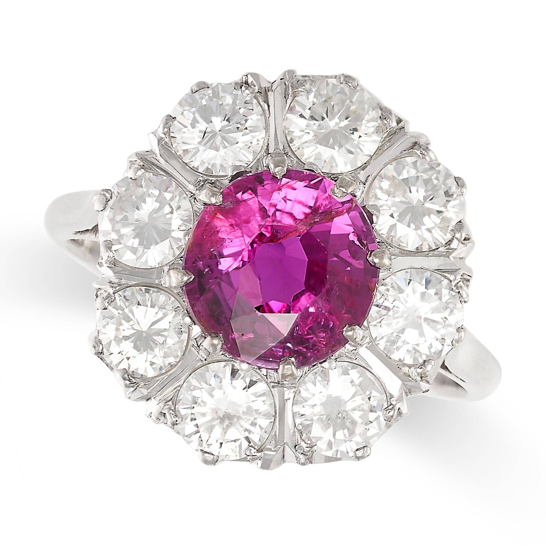 AN UNHEATED RUBY AND DIAMOND CLUSTER RING in white gold, set centrally with a round cut ruby of 1.89