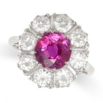 AN UNHEATED RUBY AND DIAMOND CLUSTER RING in white gold, set centrally with a round cut ruby of 1.89