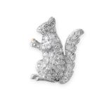 AN ANTIQUE DIAMOND SQUIRREL BROOCH in platinum and gold, designed as a squirrel clutching an