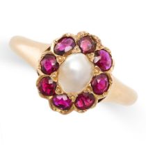 A PEARL AND RUBY DRESS RING in yellow gold, set with a pearl within a cluster of round and cushion