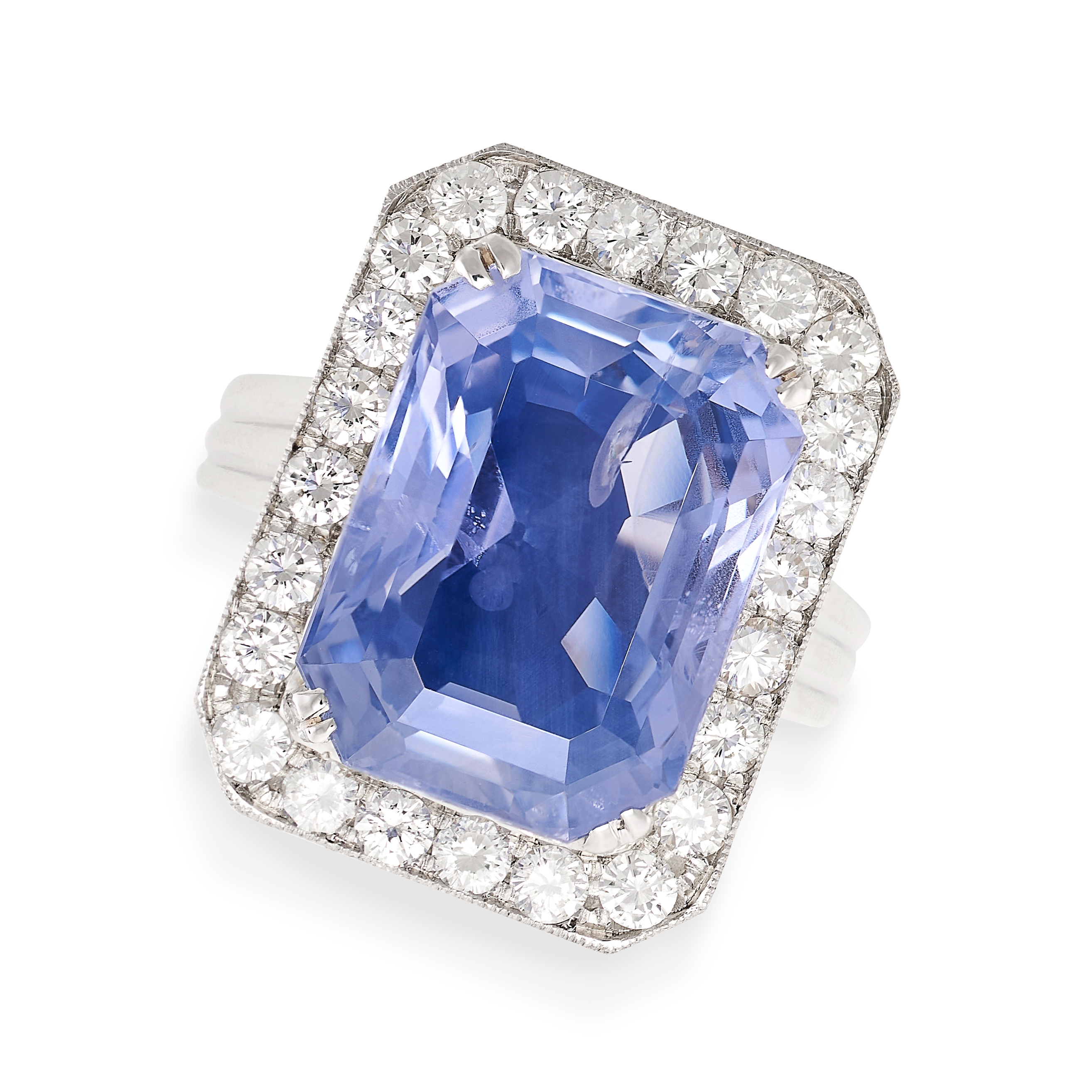 A CEYLON NO HEAT SAPPHIRE AND DIAMOND RING set with an emerald cut blue sapphire of 13.49 carats