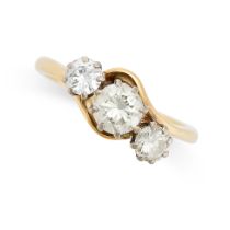 A VINTAGE DIAMOND THREE STONE RING in 18ct yellow gold, the twisted band set with three round