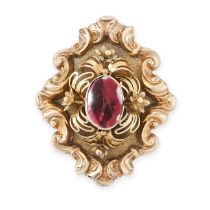 AN ANTIQUE GARNET BROOCH, 19TH CENTURY in yellow gold, the scrolling body set with an oval