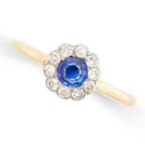 A VINTAGE SAPPHIRE AND DIAMOND RING in 18ct yellow gold, set with a round cut blue sapphire,