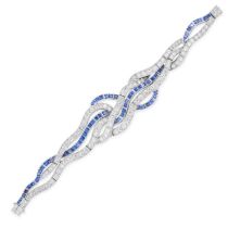 A VINTAGE SAPPHIRE AND DIAMOND BRACELET in platinum, in asymmetrical scrolling design, comprising