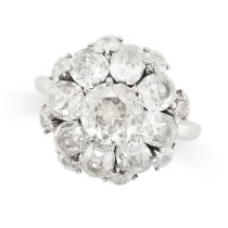 A FRENCH DIAMOND CLUSTER RING in platinum, set with a central old cut diamond of 1.10 carats, within