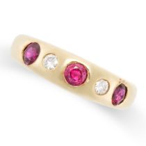 A VINTAGE RUBY AND DIAMOND GYPSY RING in 14ct yellow gold, set with three round cut rubies and two