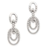 A PAIR OF DIAMOND DROP EARRINGS in 18ct white gold, each with an articulated body formed of